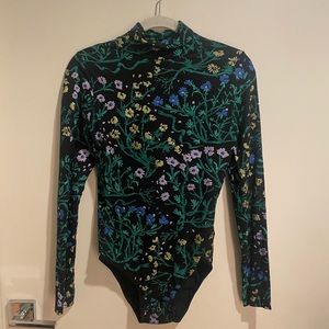 Handmade floral bodysuit from Thief and Bandit